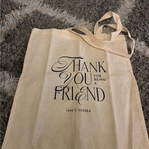 Beige Tote Bag with Thank You Print and mini disc inserts